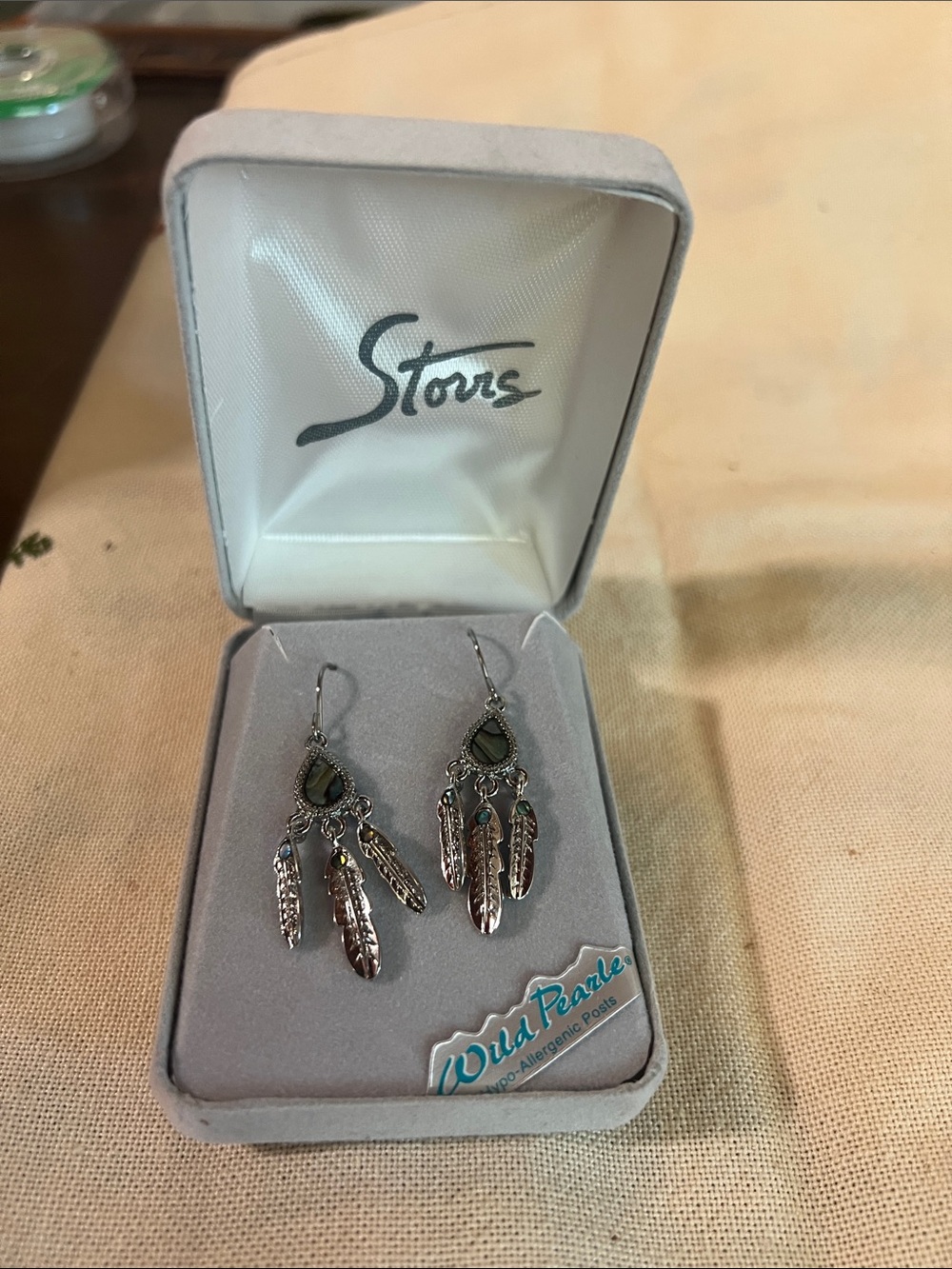 Wild Pearl Silver Feather Dangle Earrings with Green Accents